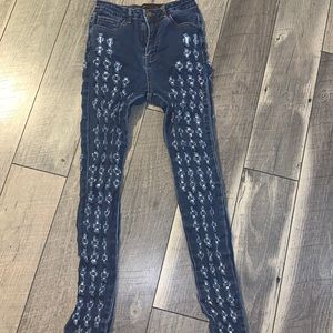 Jeans with a lot of holes
